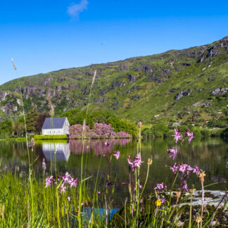 Gougane Barra is at the source of the River Lee and includes a lake with an oratory built on a small island. It also includes a forest park.